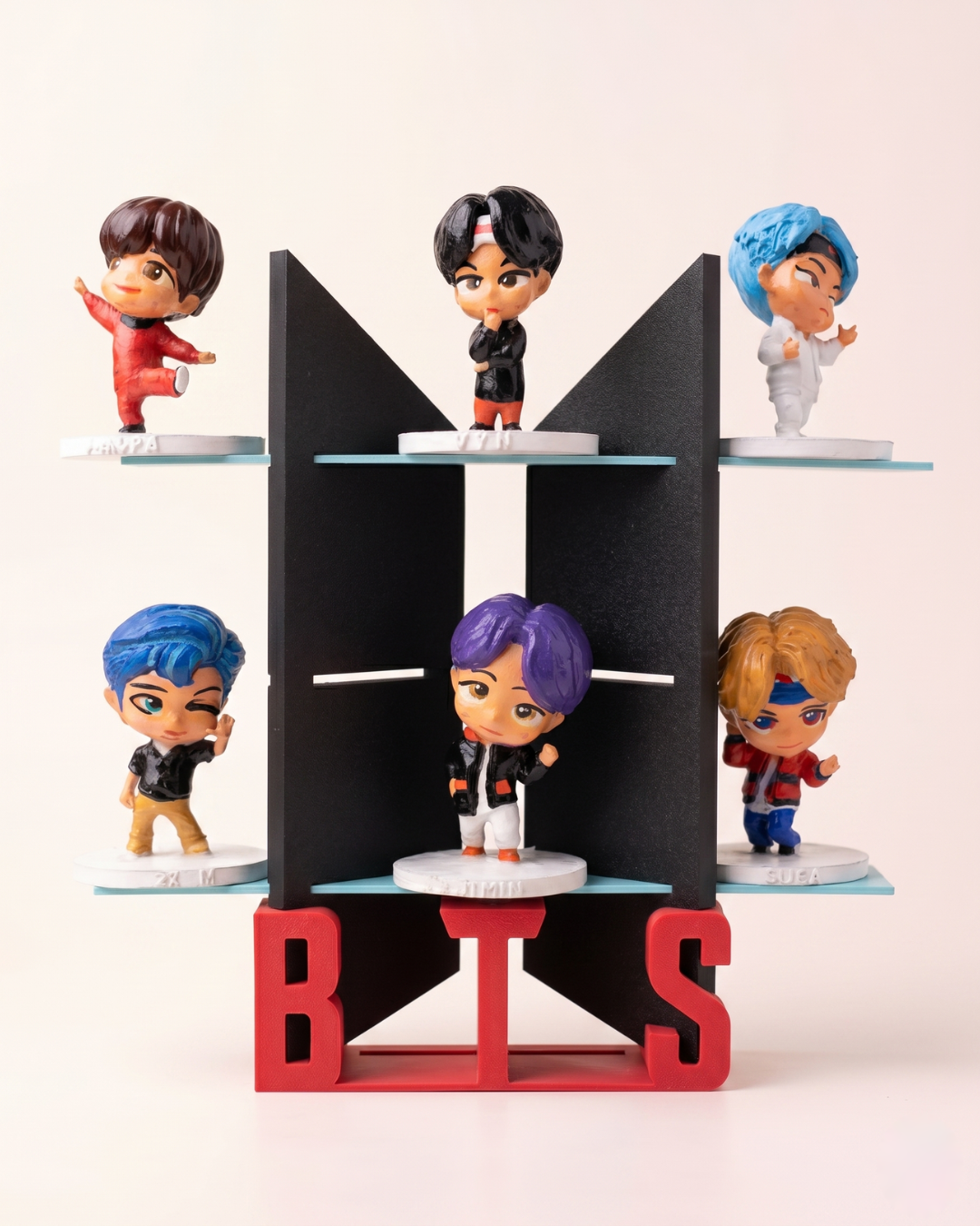 BTS stand with action figures